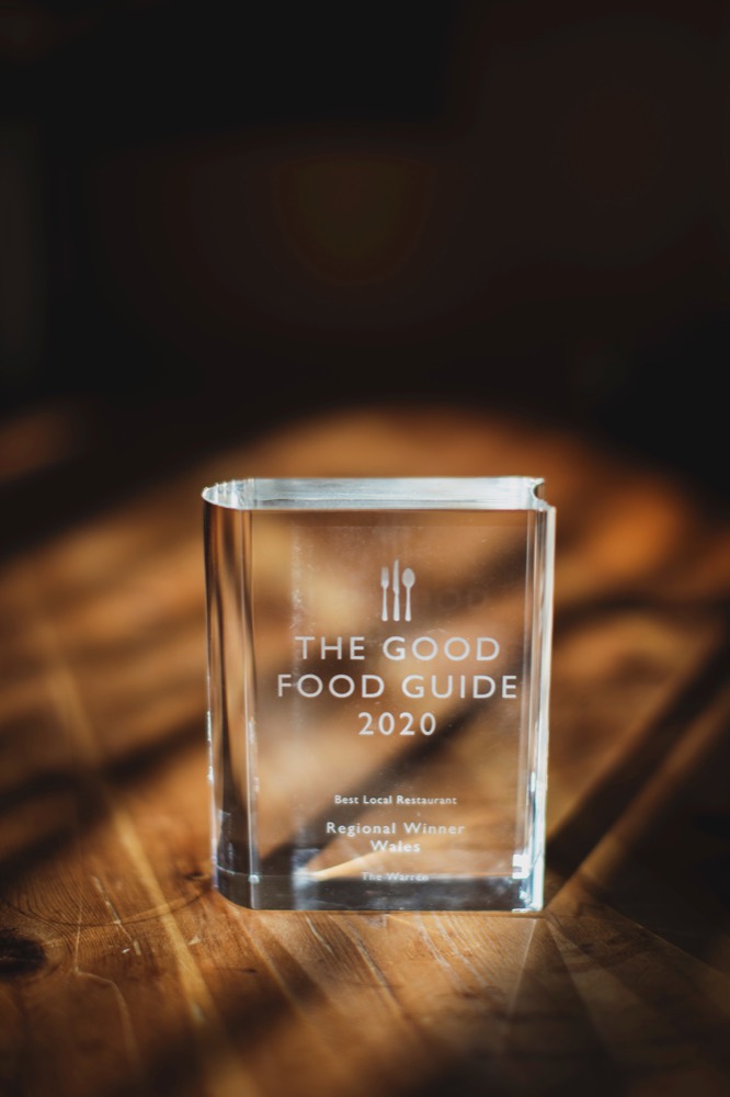 The Good Food Guide 2020 award on a table at The Warren